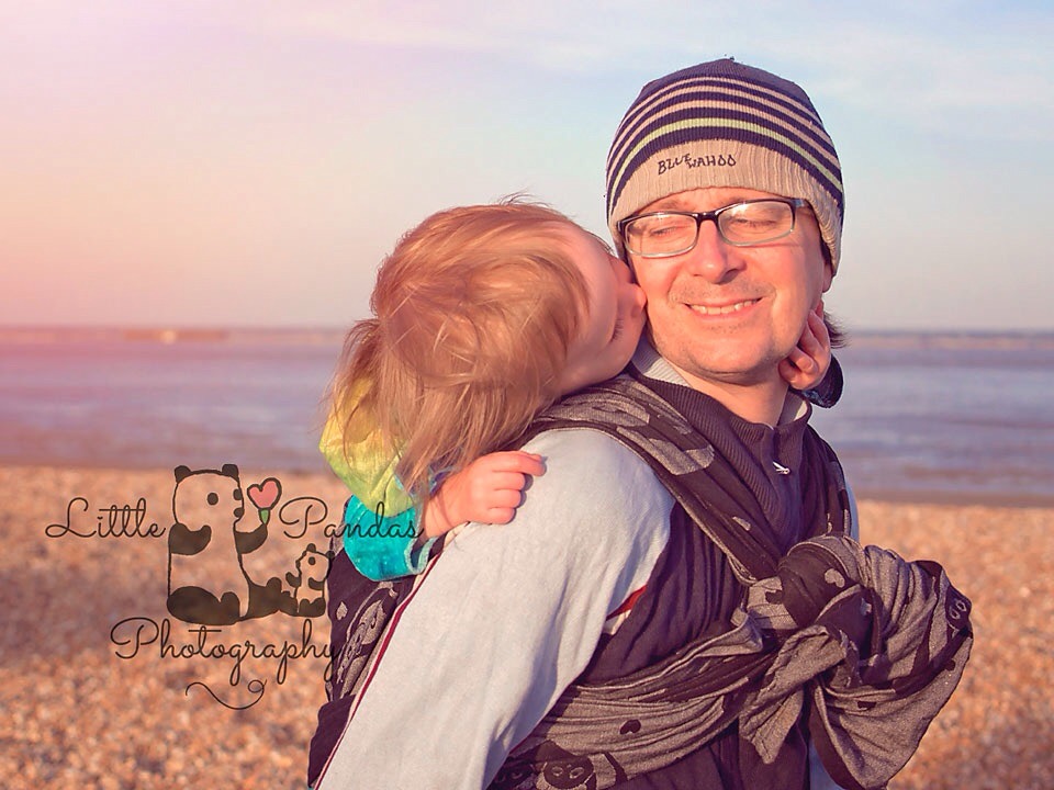 beach babywearing Dad