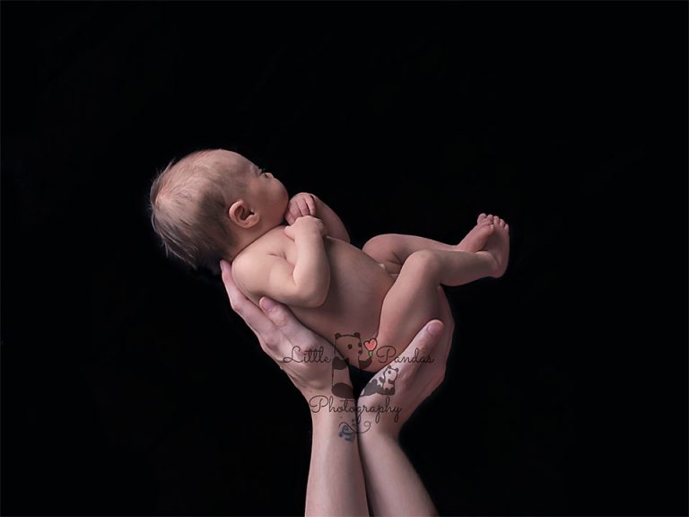 Baby in mothers hands