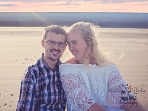 Engagement couple laughing