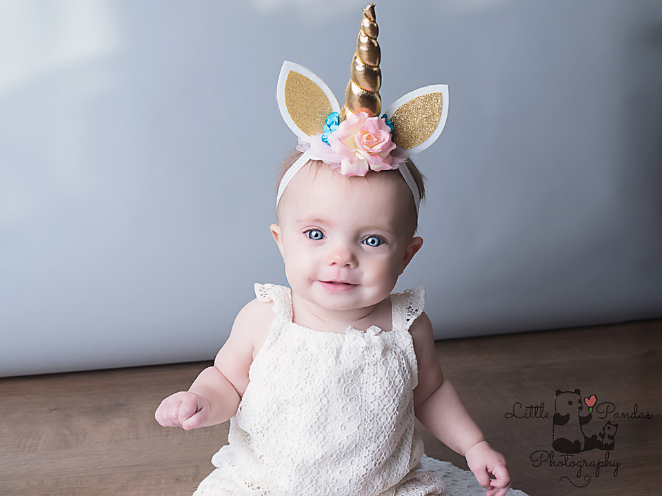 Hythe Kent baby girl sitting unicorn