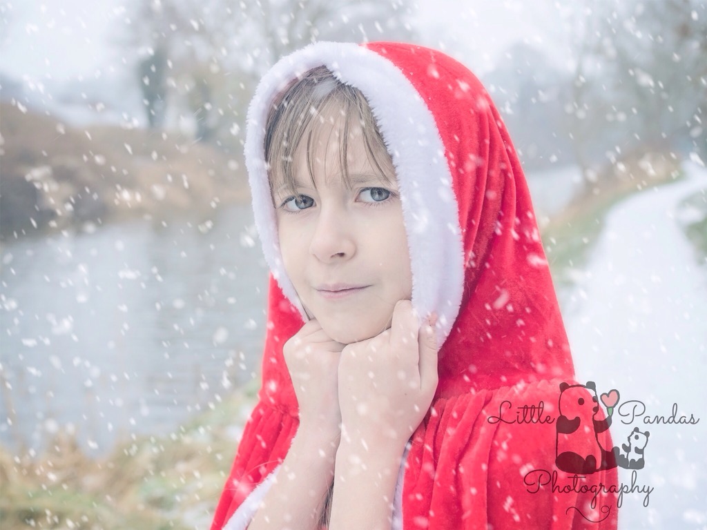 Children's photography Kent Little girl in red cape close up