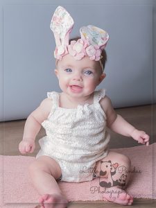 Little girl in bunny ears