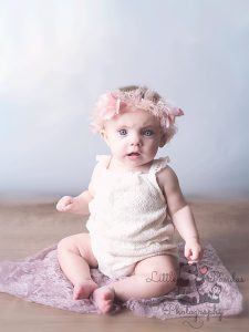 Little baby girl wearing flower crown